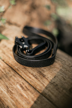 Pebble Grip BioThane® leash on wood, featuring durable texture for better grip and flexibility for active dogs.